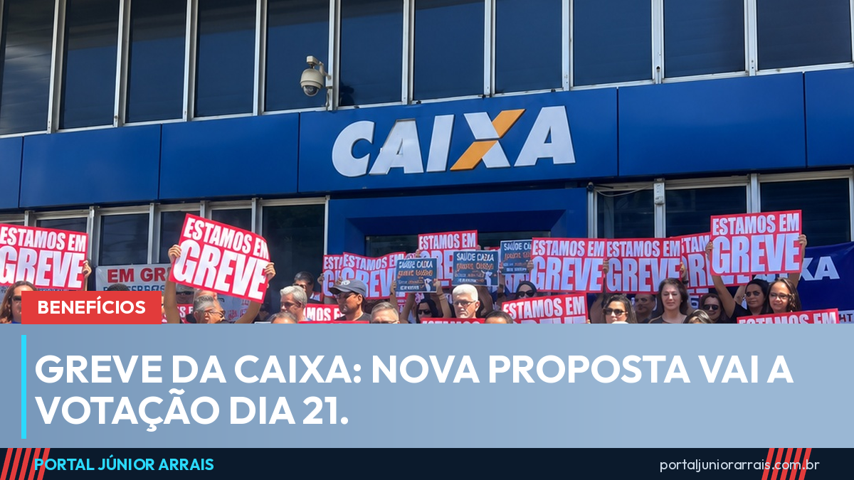 Fachada de agência da Caixa com empregados na porta segurando cartazes vermelhos escritos ESTAMOS EM GREVE